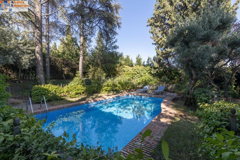 Foto 9e3cf359-9b0a-4d73-8d00-e9fb1be8d714. Chalet magnifico chalet con amplios jardines y piscina en cortijo del aire! en Albolote
