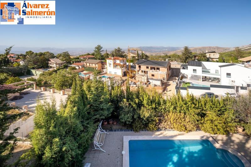 Foto d02f1686-3c81-4cf3-bc97-9ca5a22aceb2. Casa con riscaldamento piscina in Cumbres Verdes Zubia (La)