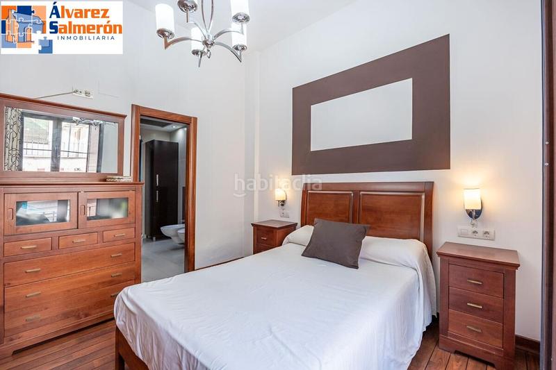 Foto 63ae1b4b-608a-4d40-853c-9dfde383952d. Ático  dúplex premium en el corazón : lujo, espacio y vistas de ensueño. en Granada