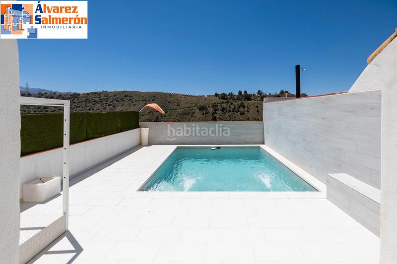 Foto 50a77ec3-49ff-4fa5-9259-56a85492f806. Casa a schiera con camino riscaldamento parcheggio piscina in Granada