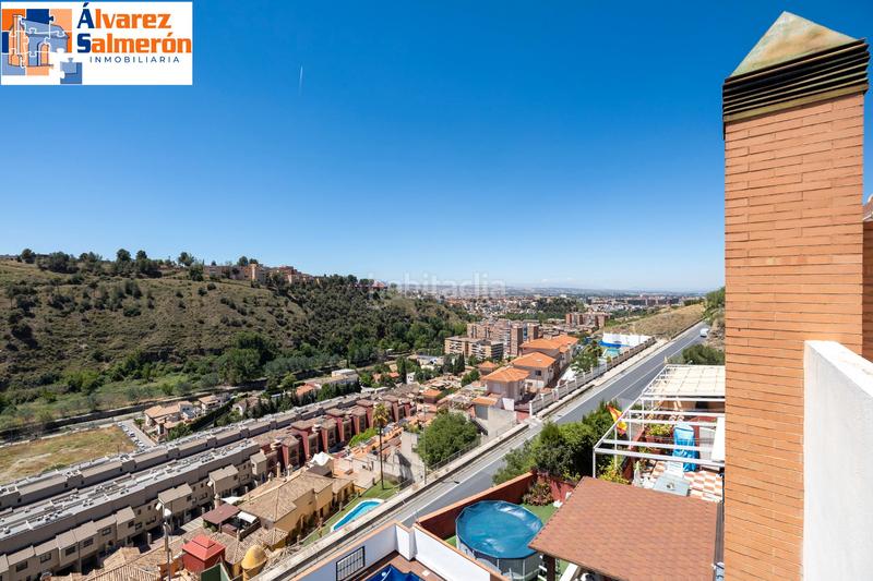 Foto f3047f39-e7fc-4155-ae42-f8c6b8916d48. Casa a schiera con camino riscaldamento parcheggio piscina in Granada