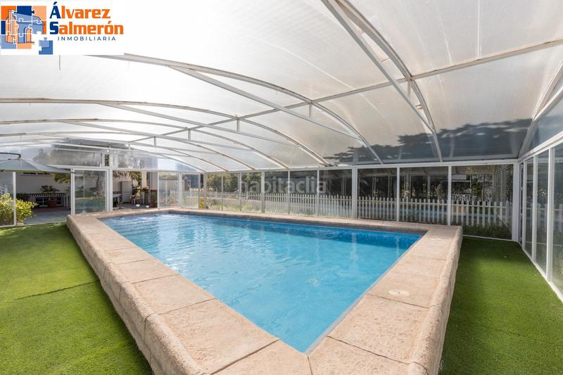 Foto 52f9729a-1aed-4e07-a646-d0eab27b46b0. Casa amb xemeneia calefacció aparcament piscina a Atarfe