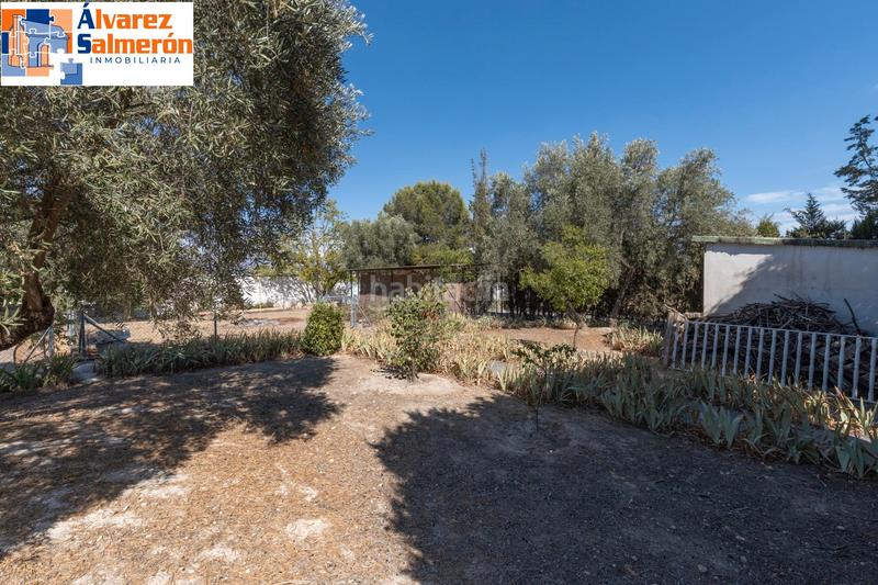 Foto 8ba653d9-3e9b-4949-b7ed-502b253a69bc. Casa amb xemeneia calefacció aparcament piscina a Atarfe