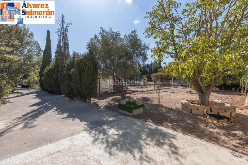 Foto b9e98bd5-5f1f-4544-b3fd-8f5d3076e215. Casa amb xemeneia calefacció aparcament piscina a Atarfe