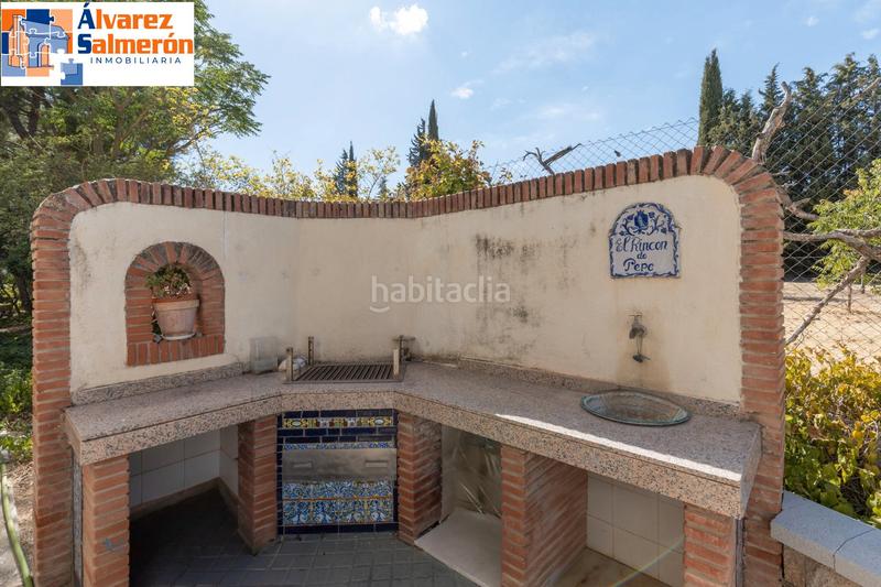 Foto bad865a1-ff5b-48d8-a7d8-639e282cd954. Casa amb xemeneia calefacció aparcament piscina a Atarfe