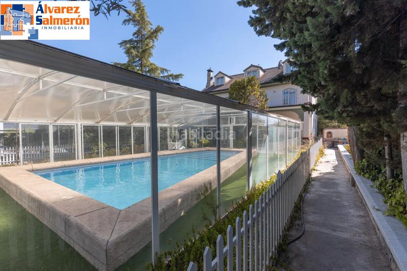 Foto bbfa98b3-c757-4bdc-86ef-6a0a8de1a631. Casa amb xemeneia calefacció aparcament piscina a Atarfe