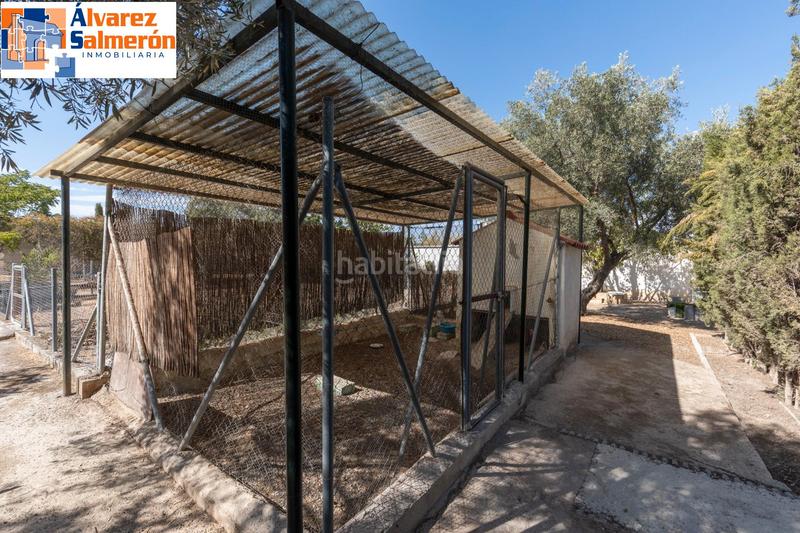 Foto f2776ea6-badf-4277-ad60-b61576865caa. Casa amb xemeneia calefacció aparcament piscina a Atarfe