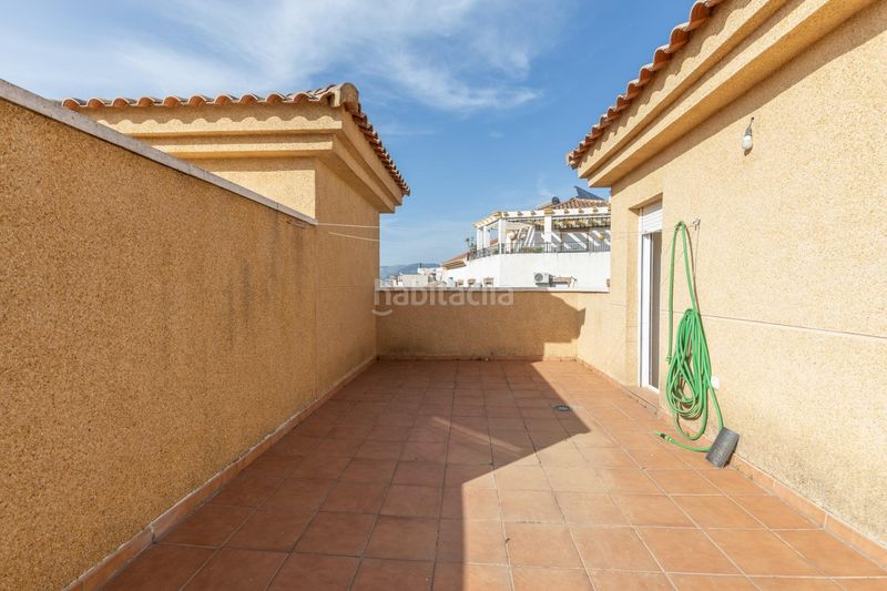 Foto b1fe1467-b44c-4837-b98d-de66ac9e63b2. Casa adossada amb aparcament a Avda. De los Ogíjares Armilla