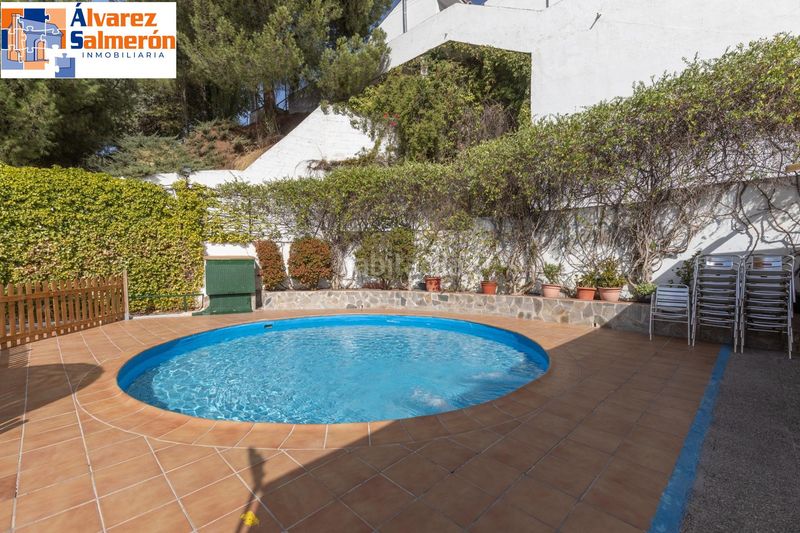 Foto 100f7355-3cf7-4c57-b0ac-21cb4bf6560f. Casa adossada amb aparcament piscina a Cenes de la Vega