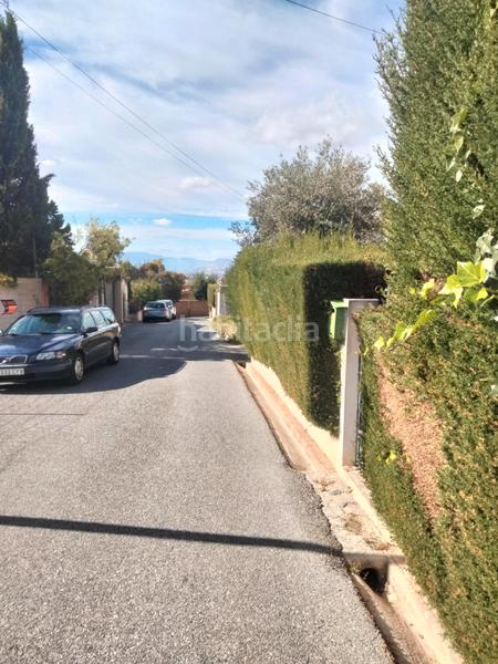 Foto 7a693c13-ac82-4ded-86b5-e3752f63d862. Terrain résidentiel dans Barrio de la Vega Monachil