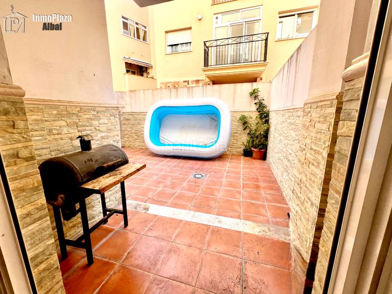 Foto d8426017-df82-42b9-991c-2af738f45866. Casa a schiera con parcheggio in Alcácer