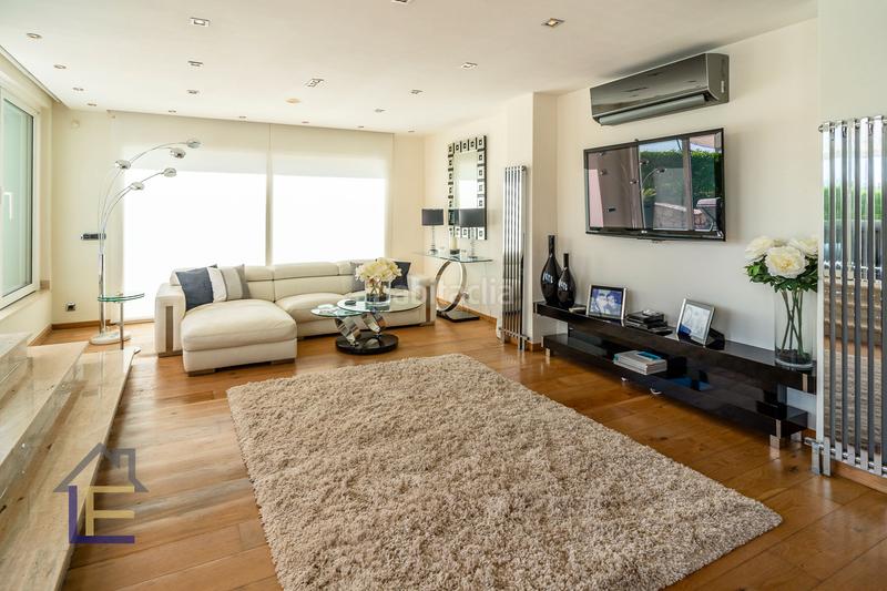 Foto 170eb3f9-a437-4aa2-bd63-dad4ad47c1a1. Casa en Cala d´Or Santanyí