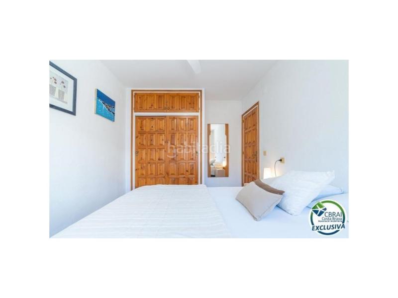 Foto 1f3d5020-229a-4719-b002-2348fc594d84. Piso apartamento vista a canal con amarre, parking y trastero en Empuriabrava
