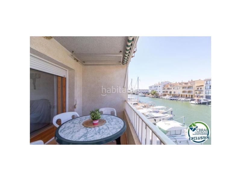 Foto 88084f33-4be3-4cbd-8ba0-1cf235b19ad1. Piso apartamento vista a canal con amarre, parking y trastero en Empuriabrava