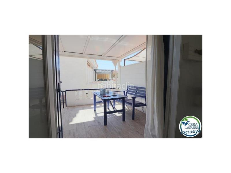Foto c0d71db8-f993-4ca9-9493-a3ddd5984660. Casa  con gran terraza al sur adosada ubicada en la zona de Sant Maurici en Empuriabrava