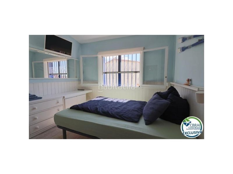 Foto 7a83ab78-d905-48c2-894c-ff7d0a58b132. Casa  con gran terraza al sur adosada ubicada en la zona de Sant Maurici en Empuriabrava