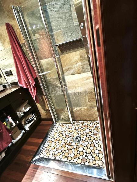 Foto b1ac0e0f-7a71-409c-b987-8bc54eaff7bf. Appartamento con riscaldamento in O Castro Vigo