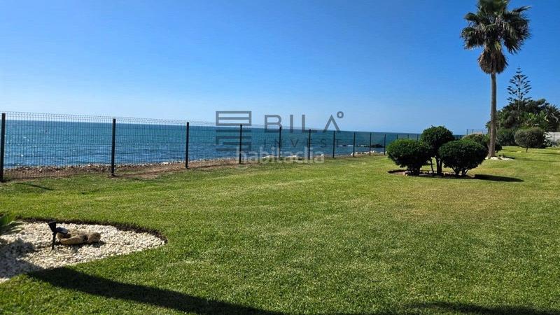 Foto ad805bb8-05cf-4388-8ca5-2c3a95426d41. Piso  en venta en 1 linea de playa en urb. mohana, el faro, costa en Mijas