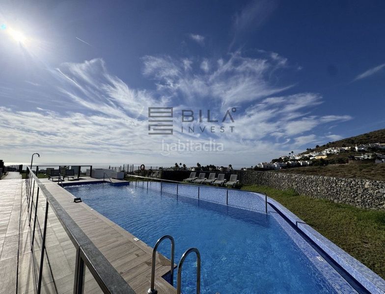Foto 1d2ff523-a6db-4839-874b-0d77a46ea0d3. Casa adossada amb piscina a Riviera del Sol Mijas
