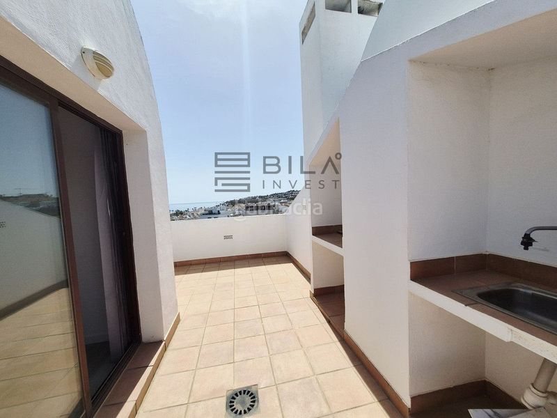 Foto cd77d57b-7e80-48fa-8983-4cf522be58a9. Casa adossada amb piscina a El Faro de Calaburra - Chaparral Mijas