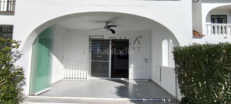 Foto aaf7ff1f-6ce4-4a65-b2b0-f1f5af698f93. Casa adossada amb piscina a Riviera del Sol Mijas