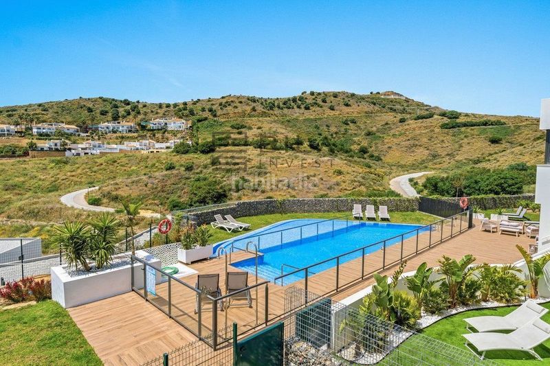 Foto 77a0ebe8-a260-49dd-a230-36cb849c3e05. Casa adossada amb piscina a Riviera del Sol Mijas