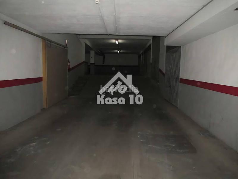 Foto cb6ea504-449a-483b-8bd6-29f406c2547d. Parking voiture dans Ibi