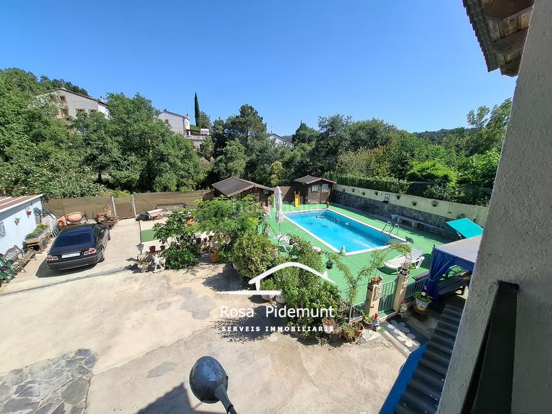 Foto be2977d1-55fb-4c3c-92fd-92fb80cb94dc. Casa con camino parcheggio piscina in Aiguaviva Parc Vidreres