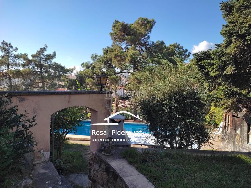Foto 22d3929c-5a5b-42c3-9d63-2a135f00537d. Chalet with fireplace heating parking pool in Roca Grossa Lloret de Mar