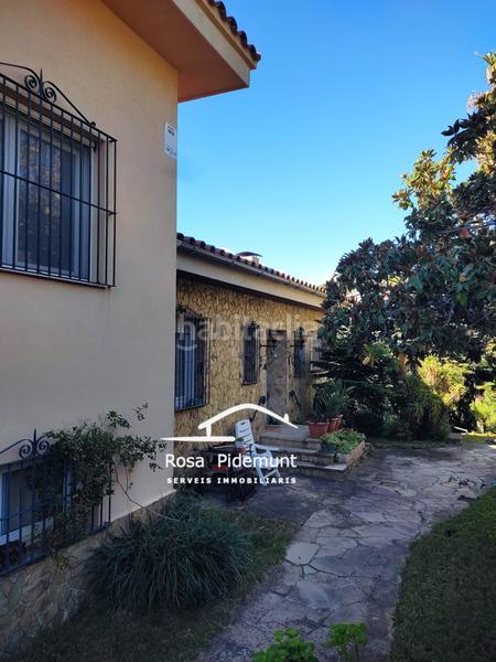 Foto 6c15822f-1409-49c4-aef4-46eceb68e0d1. Chalet with fireplace heating parking pool in Roca Grossa Lloret de Mar