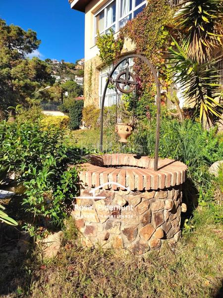 Foto 905f5586-ad2b-45fe-a170-39f6d39bfef2. Chalet with fireplace heating parking pool in Roca Grossa Lloret de Mar