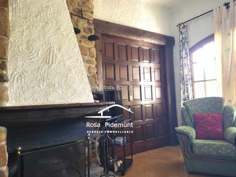 Foto c2bf86ef-f9b9-42ea-a9f7-87b9161d5869. Chalet with fireplace heating parking pool in Roca Grossa Lloret de Mar