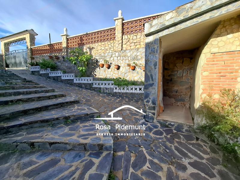 Foto c4f0425c-617e-48ef-b44a-8d410cce27f0. Maison avec cheminée chauffage parking dans Residencial Park Maçanet de la Selva