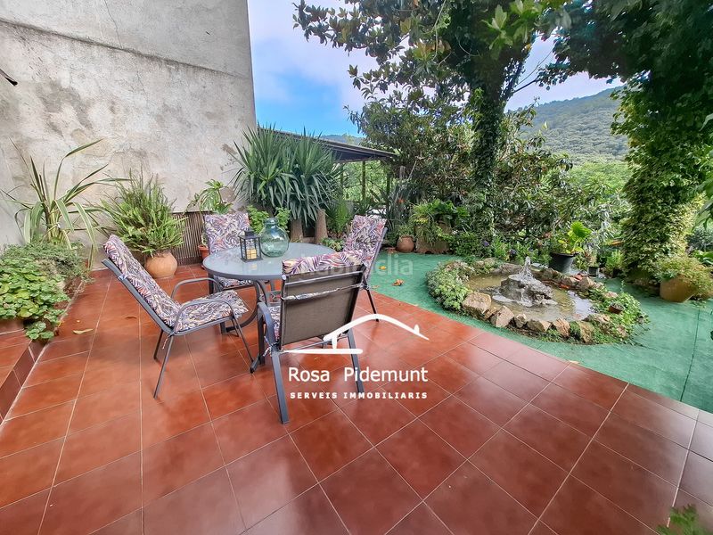 Foto c2daddc0-a5e2-4463-91a5-c09b1d5121d9. Casa adossada amb xemeneia calefacció aparcament a Palafolls