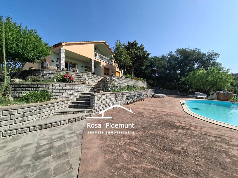 Foto 978ce2ab-660a-4835-9b15-50cd25b5932b. Chalet con camino riscaldamento parcheggio piscina in Maçanet de la Selva