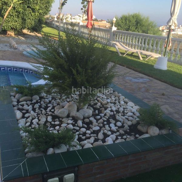Foto 7032a5ff-42d5-4778-817f-45147b7a9f04. Chalet avec chauffage piscine dans Urbanización Santa Rosa Torrox