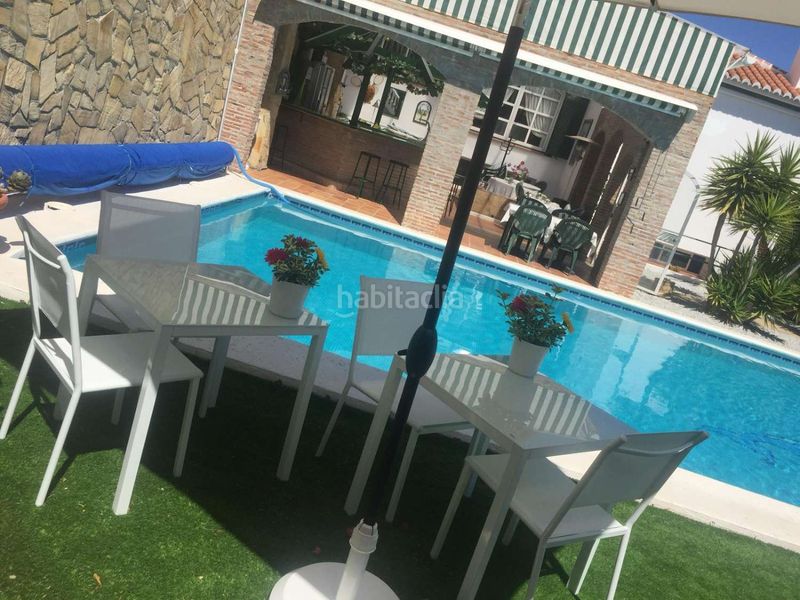 Foto ced8fc93-146d-41fb-ac2a-fb6a4cc19eff. Chalet avec chauffage piscine dans Urbanización Santa Rosa Torrox