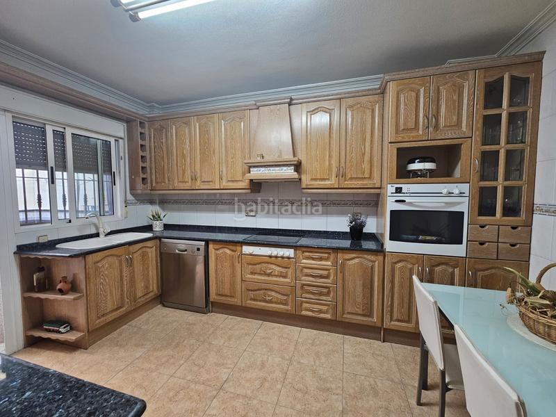 Foto 1e43b62c-5063-4a2b-9e67-685439e4adbb. Casa adossada a calle la lira 4 a Rojales