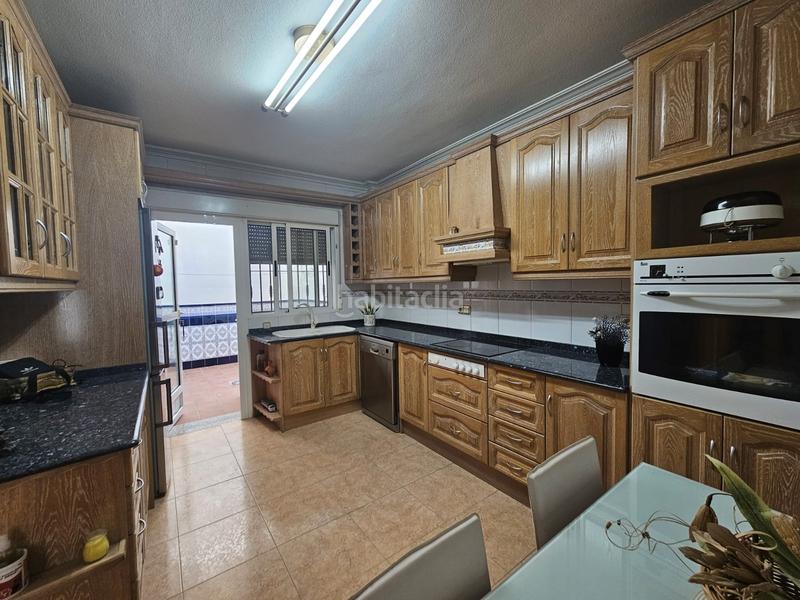 Foto 98148c74-dc95-402b-9860-f536acd5e635. Casa adossada a calle la lira 4 a Rojales