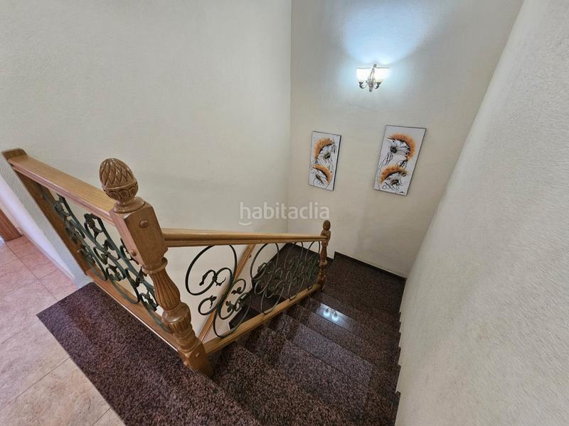 Foto d3a8dc3a-f847-4790-a155-994ecc0f2f8e. Casa adossada a calle la lira 4 a Rojales