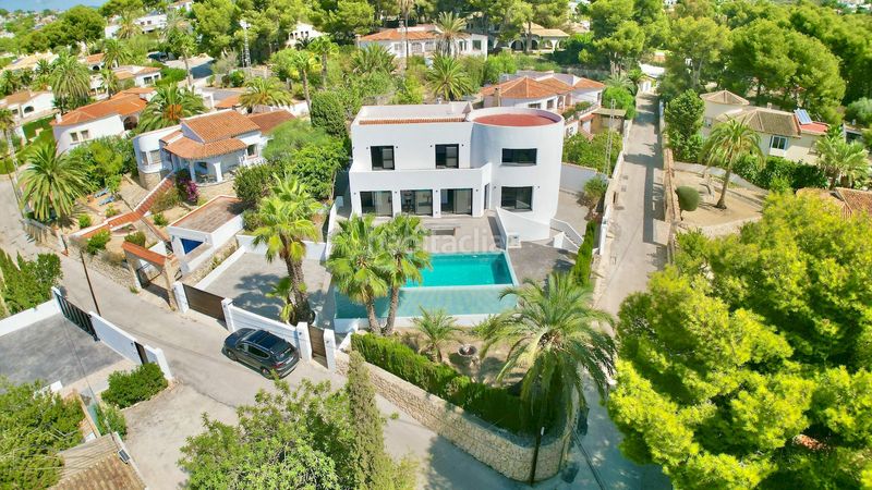 Foto 8fc1e41d-bc75-4e13-85fa-f36414bda0ef. Casa amb calefacció aparcament piscina a El Portet-Pla del Mar Moraira