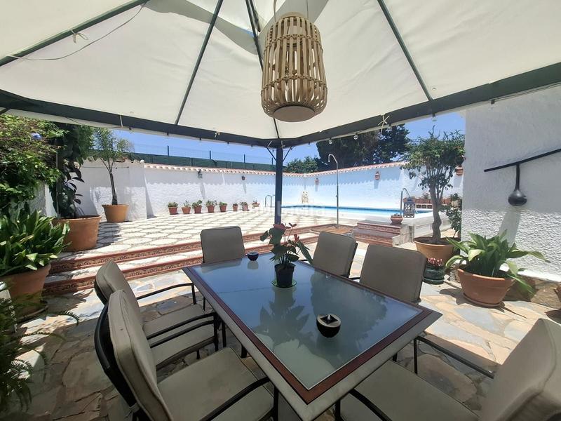 Foto 91f9b0ec-f7b7-4de5-8ce7-aef76fb747cc. Casa exclusiva oportunidad de chalet en venta de tres habitaciones, dos baños, piscina, patio, y demás... en chullera, manilva!! en Málaga