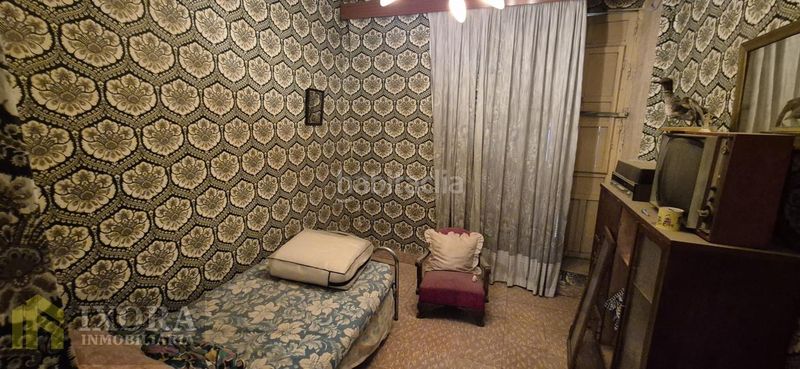 Foto 7568141d-5803-448f-a9b8-cdf02a8e6d72. Casa amb aparcament a Centro ciudad Linares