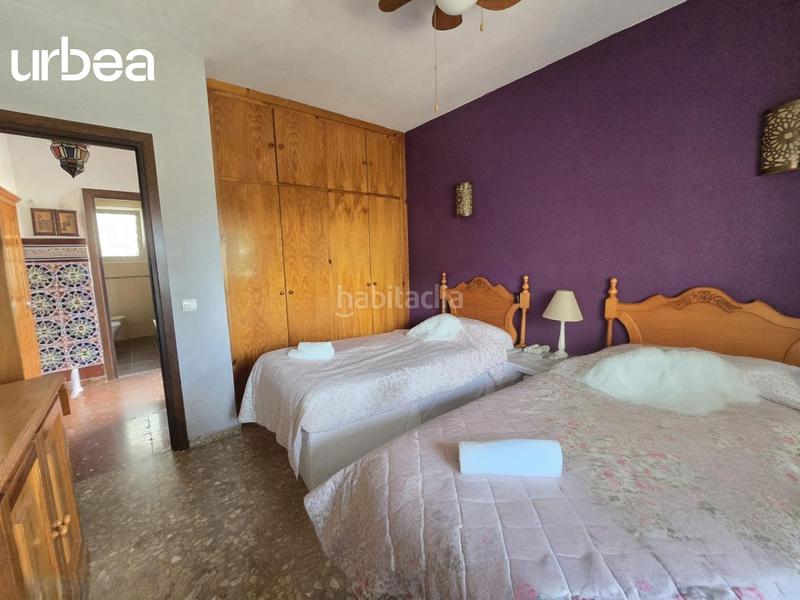 Foto c5893648-a4a6-4dd6-bea0-912e8d9c4467. Xalet amb aparcament piscina a Torremuelle Benalmádena