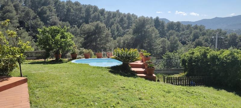 Foto f298a645-4934-492f-b123-23b130b5ff93. Maison avec cheminée chauffage parking piscine dans Cervelló