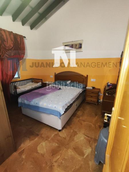 Foto 54cc4a98-635a-4567-b27b-4404a37aeafb. Casa amb aparcament a Roldán Torre - Pacheco