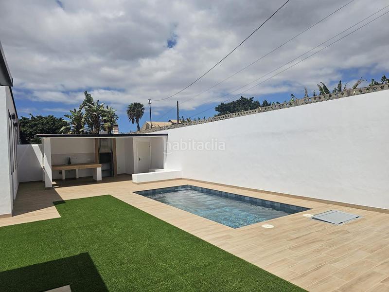 Foto 66ac1039-3a3c-4b32-bfb9-87e778031e60. Casa venta en Guargacho de dos casas con piscina en Arona