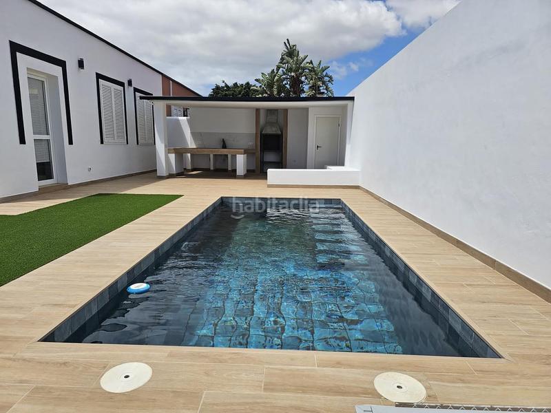 Foto 8a8feb9b-ef6c-42c3-b0a4-c58c3ea238ed. Casa venta en Guargacho de dos casas con piscina en Arona
