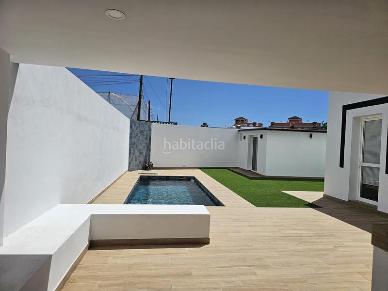 Foto 9c196048-1e78-4635-a359-99847fc9620f. Casa venta en Guargacho de dos casas con piscina en Arona