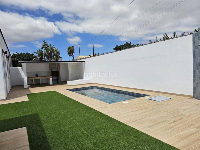 Foto ad26f9fd-1a69-4b71-a289-bc7f493d4e76. Casa venta en Guargacho de dos casas con piscina en Arona